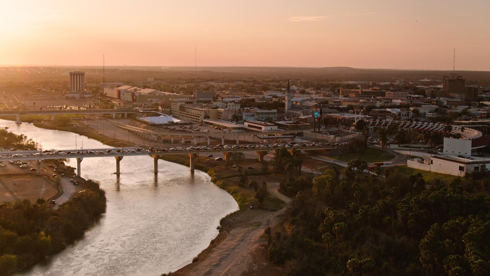 Laredo, Texas at sunset, with the Rio Grande and its bridges